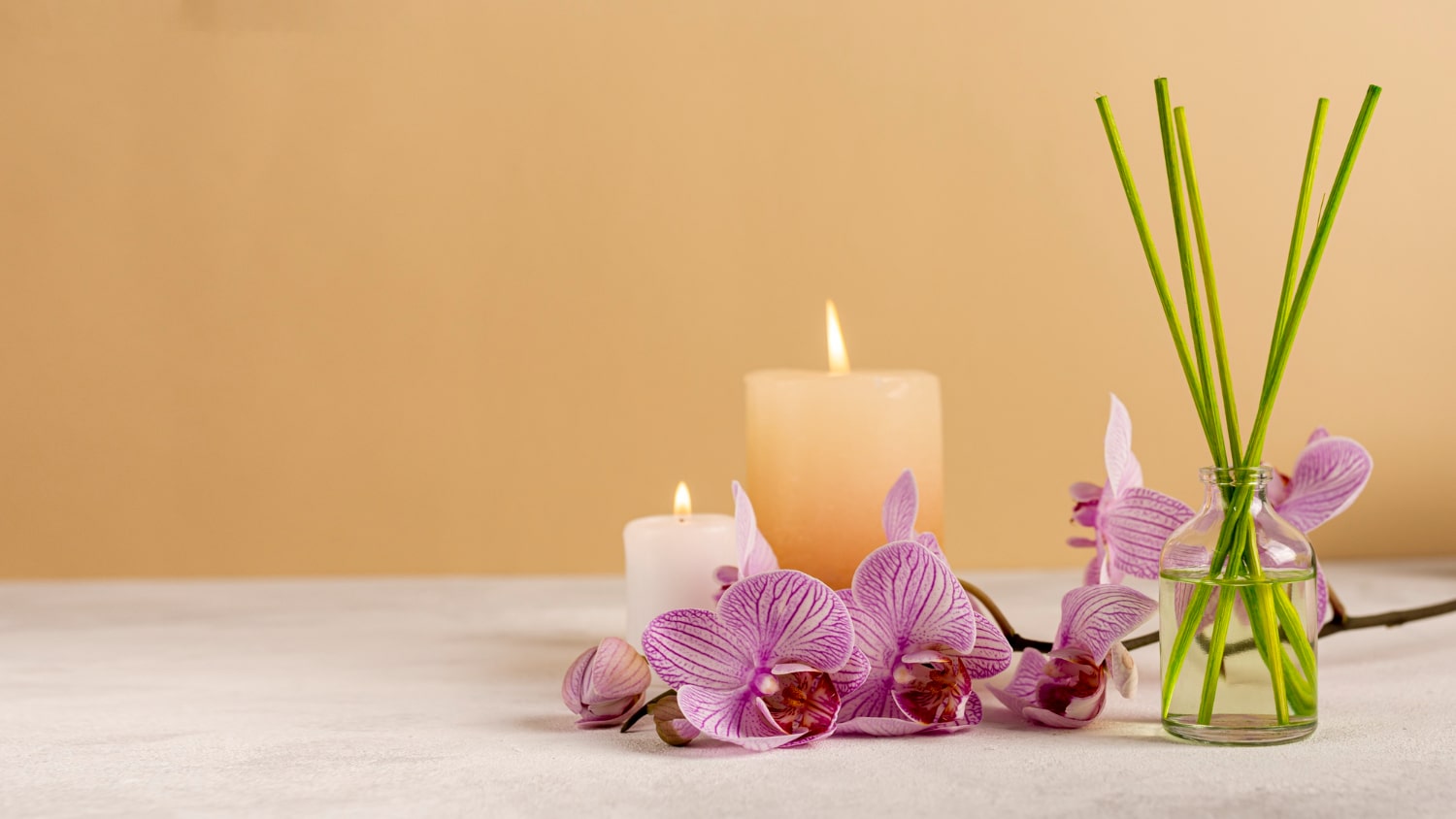 spa-decoration-with-candles-scented-sticks-min